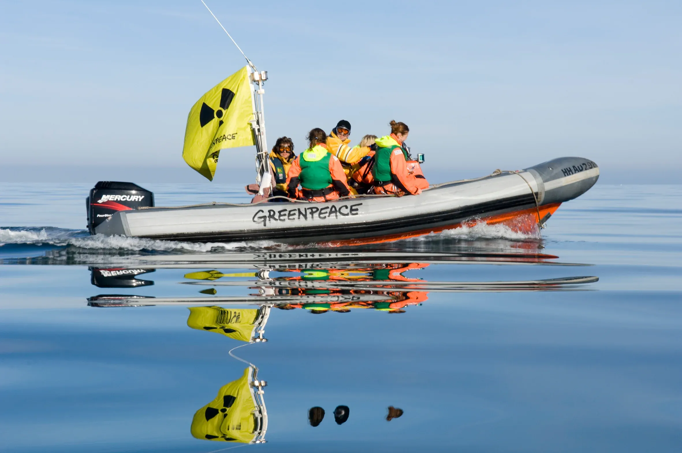 Assault navigation boat gliding across calm waters during tactical exercise